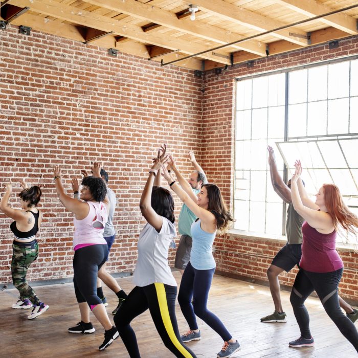 Diverse people in an active dance class